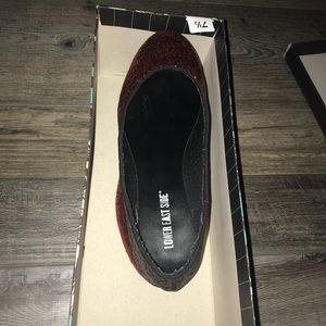 sparkly red faded into black flats